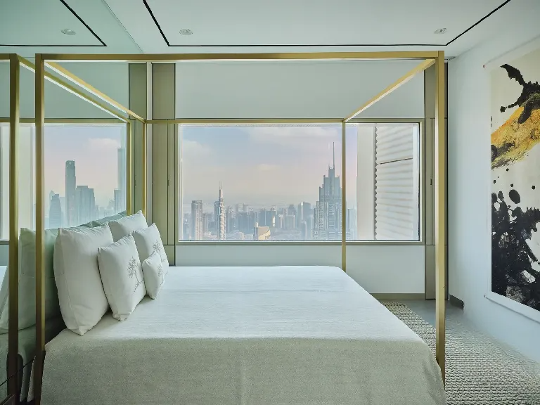 The Art of Minimalist Luxury: Inside a Dubai Penthouse Inspired by Nature , bedroom with plenty of natural light and stunning view