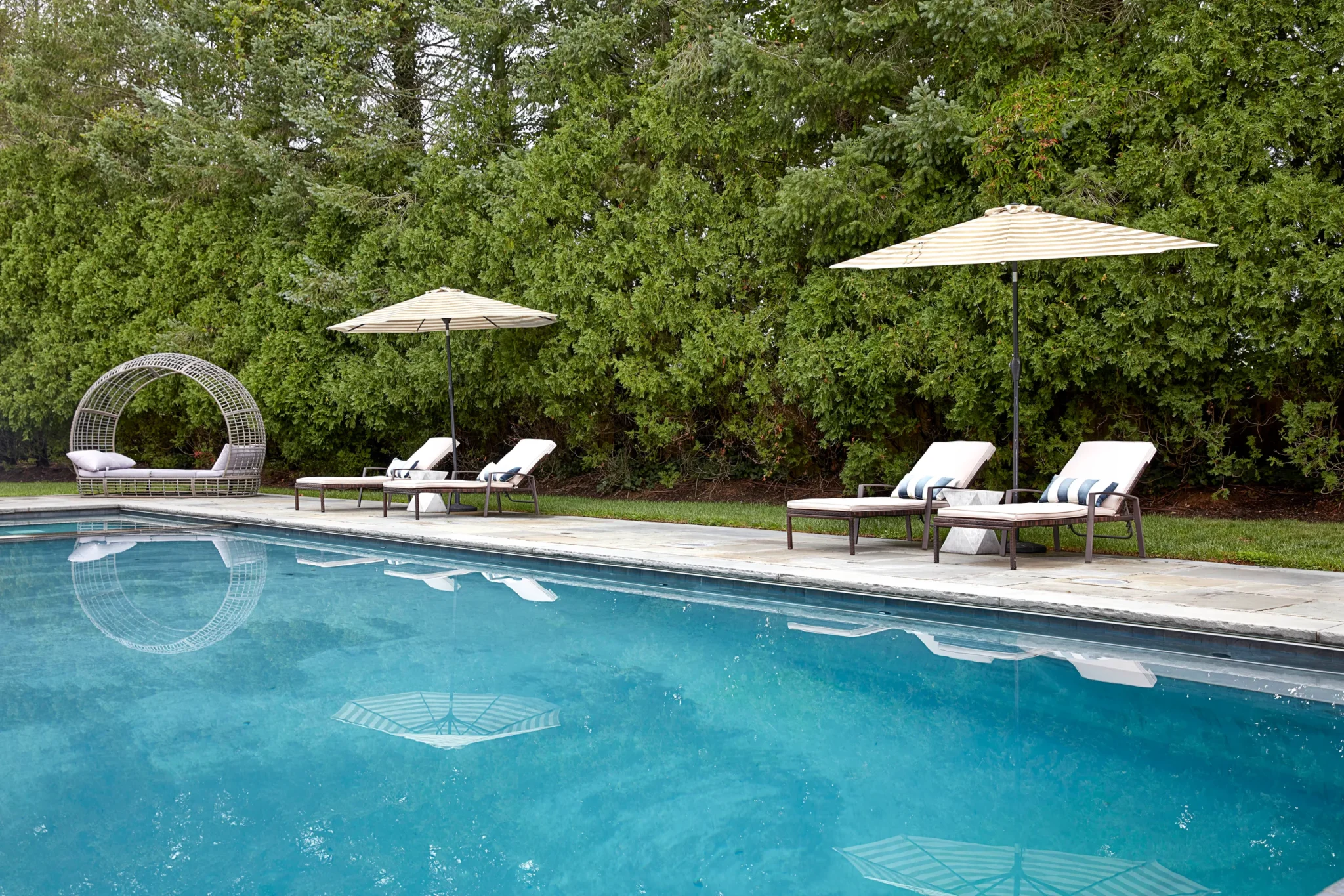 Outdoor area with pool and lounging area