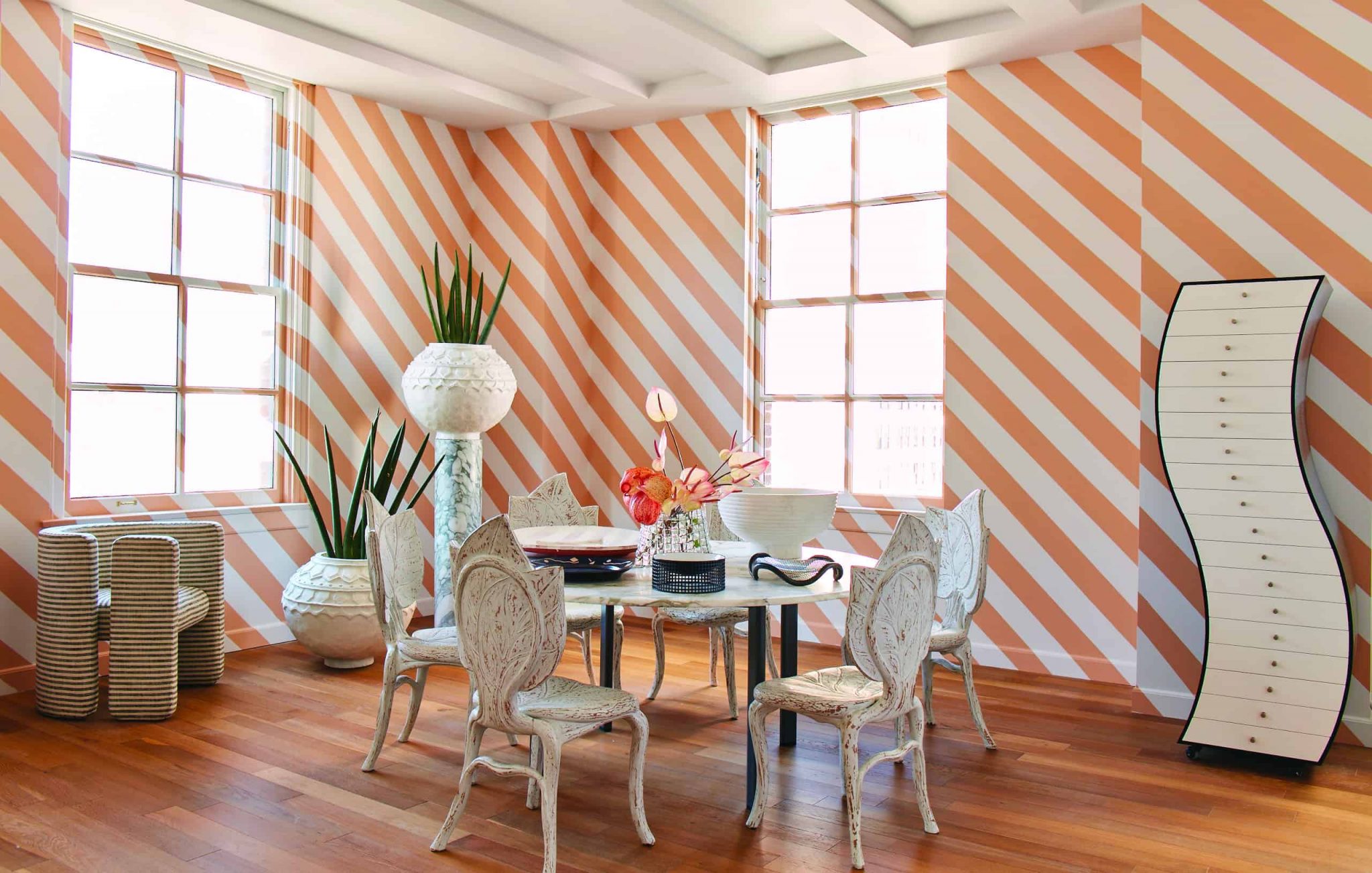 colorful interior design in orange hues by kelly wearstler