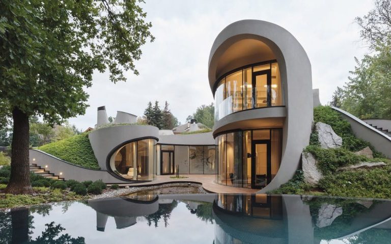 Futuristic Modern House Among Landscape by Niko Architect Studio
