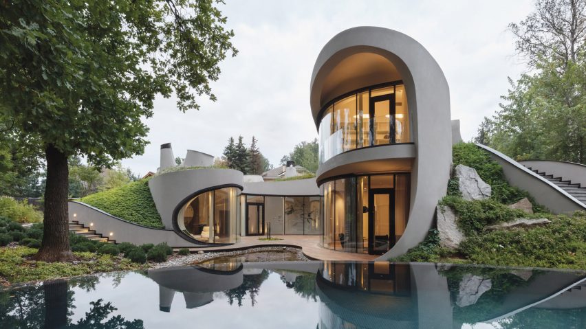 Futuristic Modern House Among Landscape