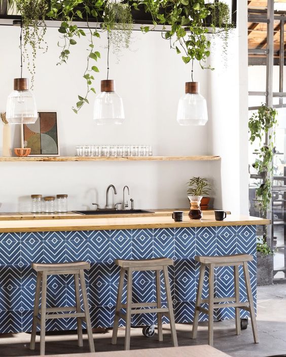 Outdoor bar with a tile kitchen island