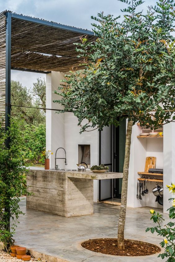 Luxury outdoor kitchen in a mix of natural textures