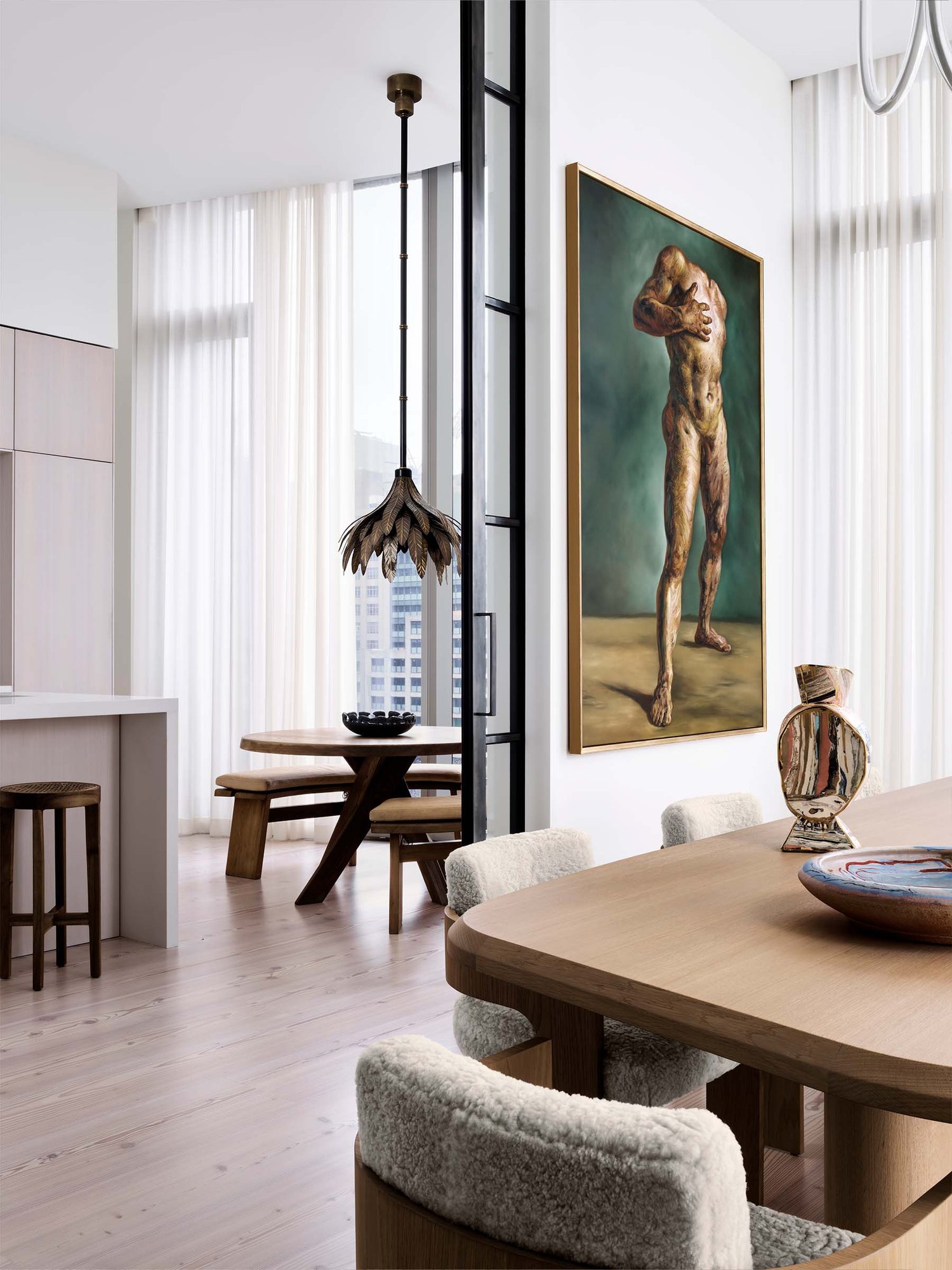Contemporary dining room with a fantastic painting of a man with no head