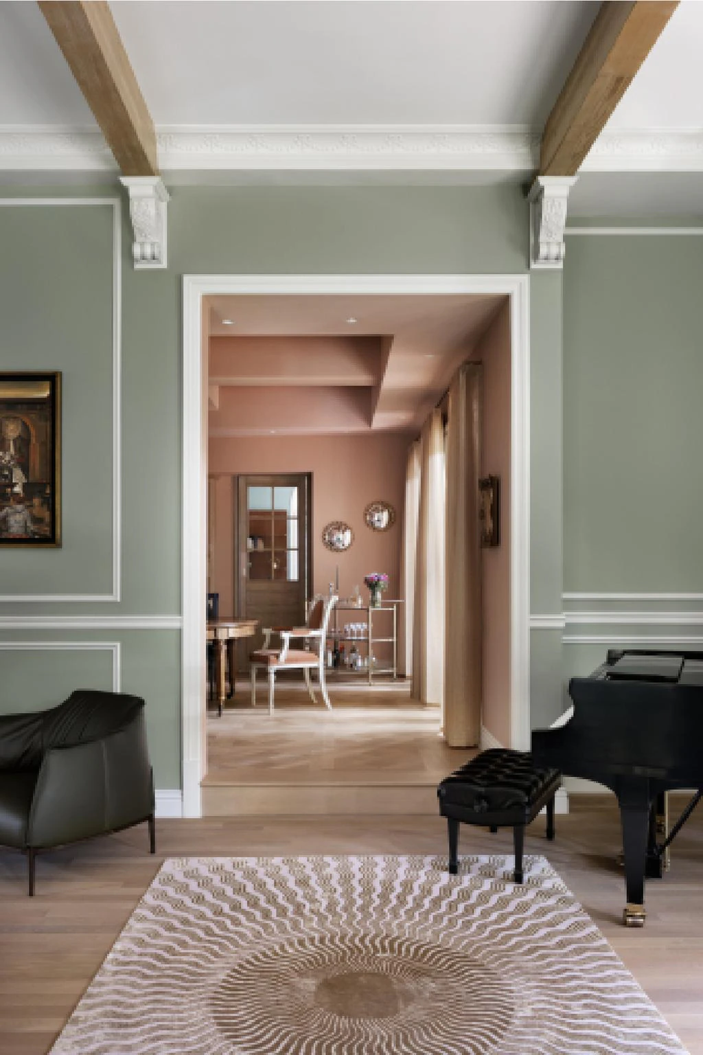 A door that connects the living room to the dining room of a mansion