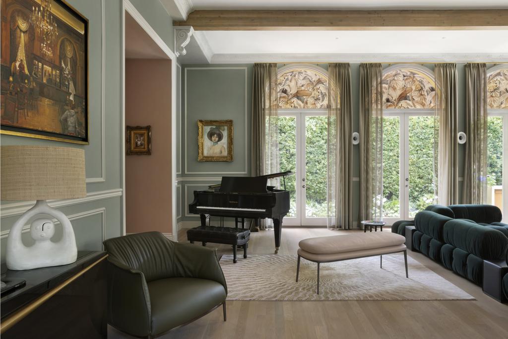 A piano in the living room of the mansion
