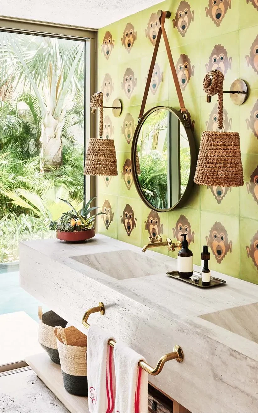 Bathroom with monkey tiles and tropical decor