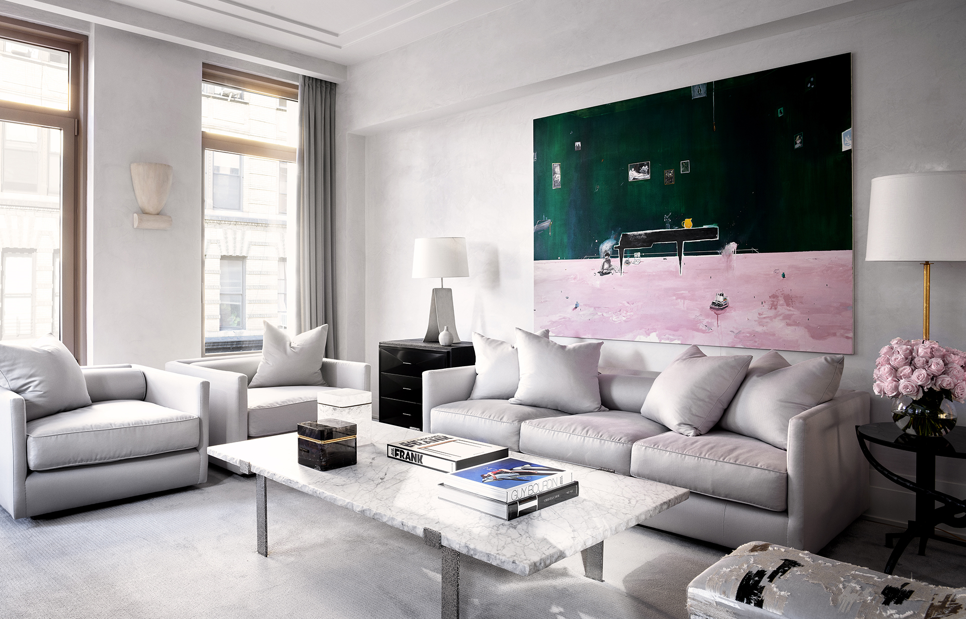 Contemporary living room in grey tones contrasting with a pink painting