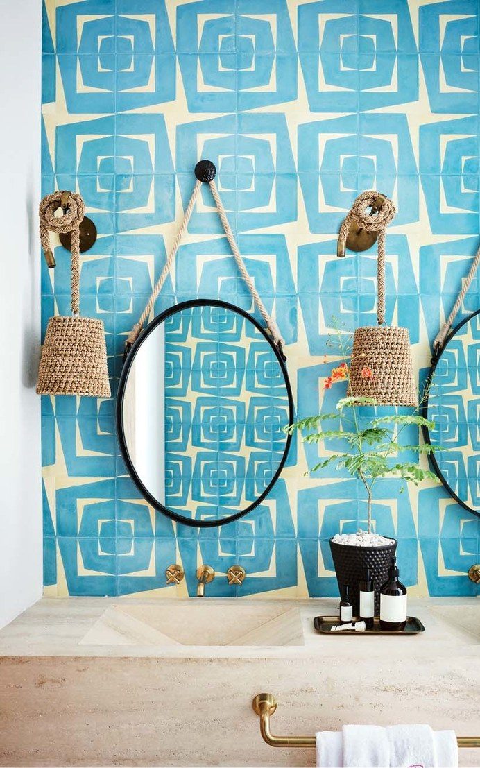 Bathroom featuring a blue tropical wallpaper