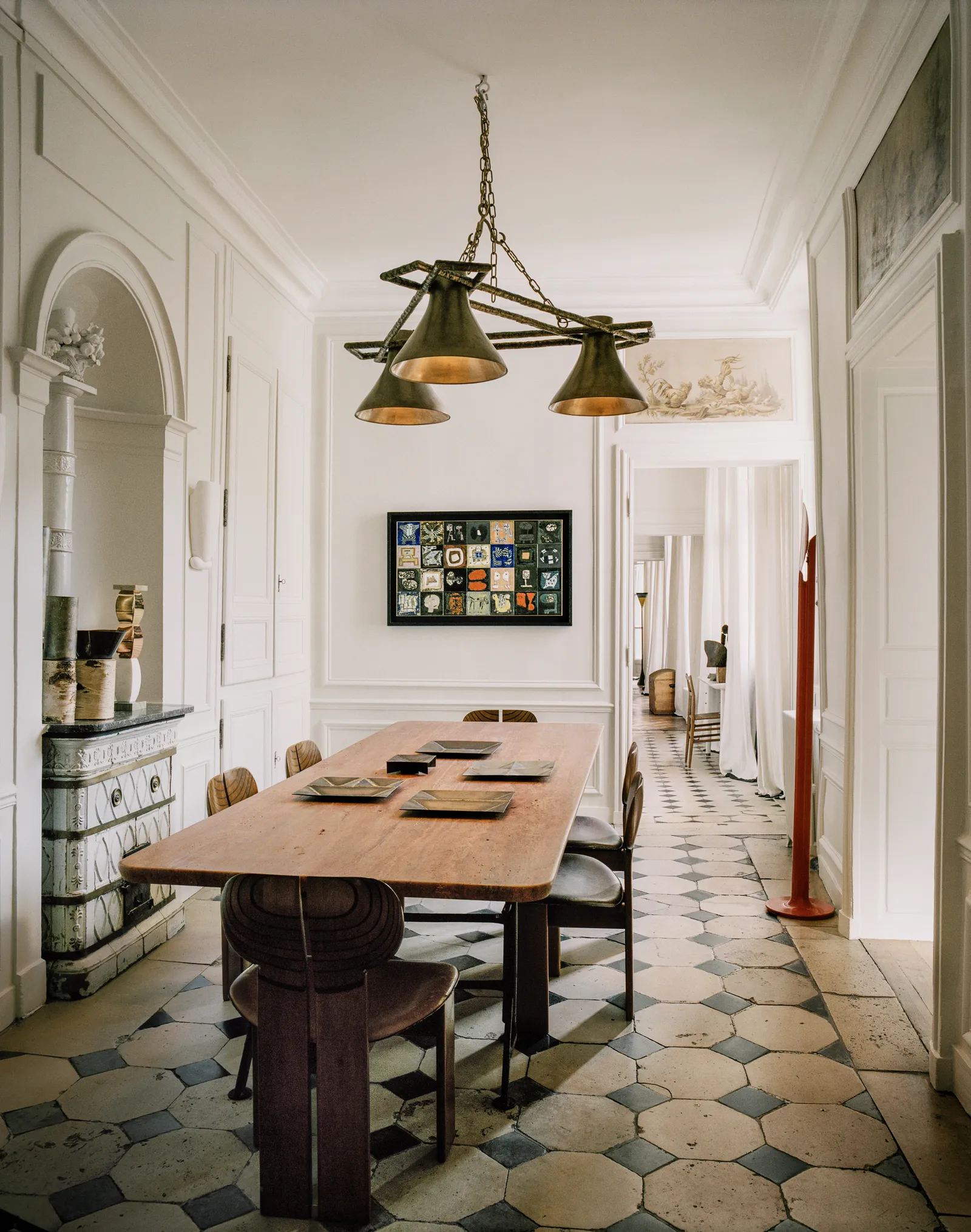 Dining room with a  big rectangle marquetry table