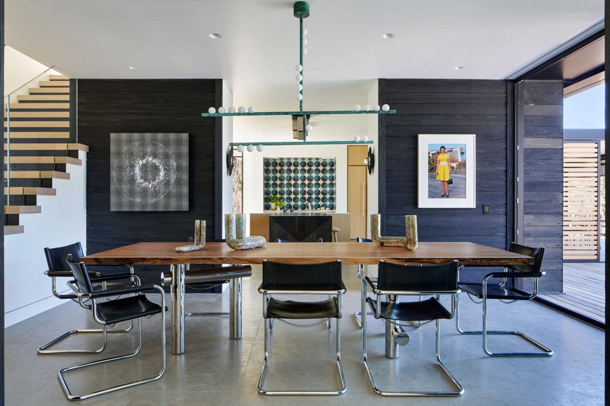 Mid century modern dining room with amazing artwork