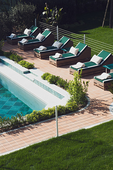 Pensione America: A Luxury Boutique Hotel with Soul, swimming pool area with sunbeds