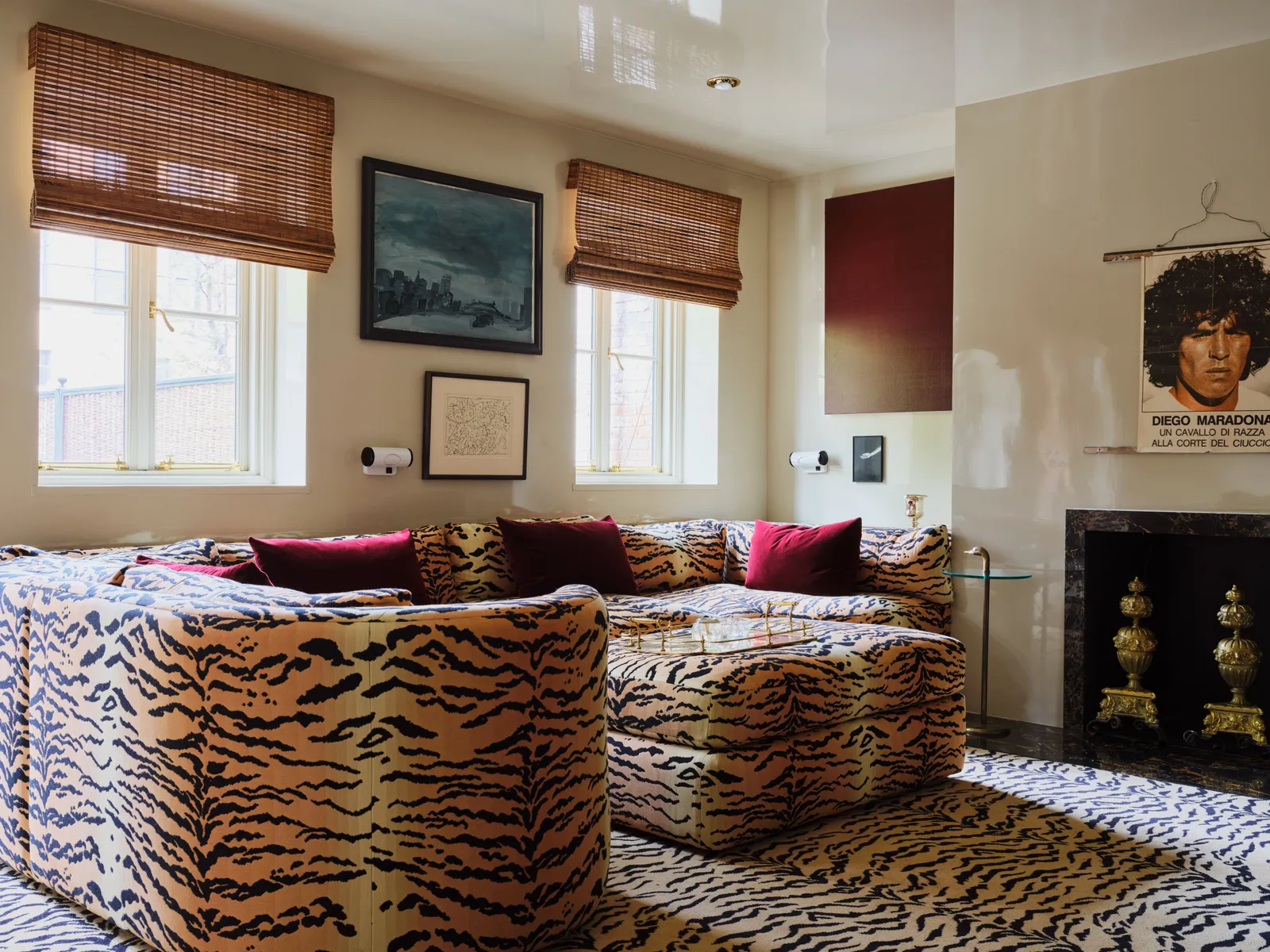 living room with animal print patter in the sofa and carpet