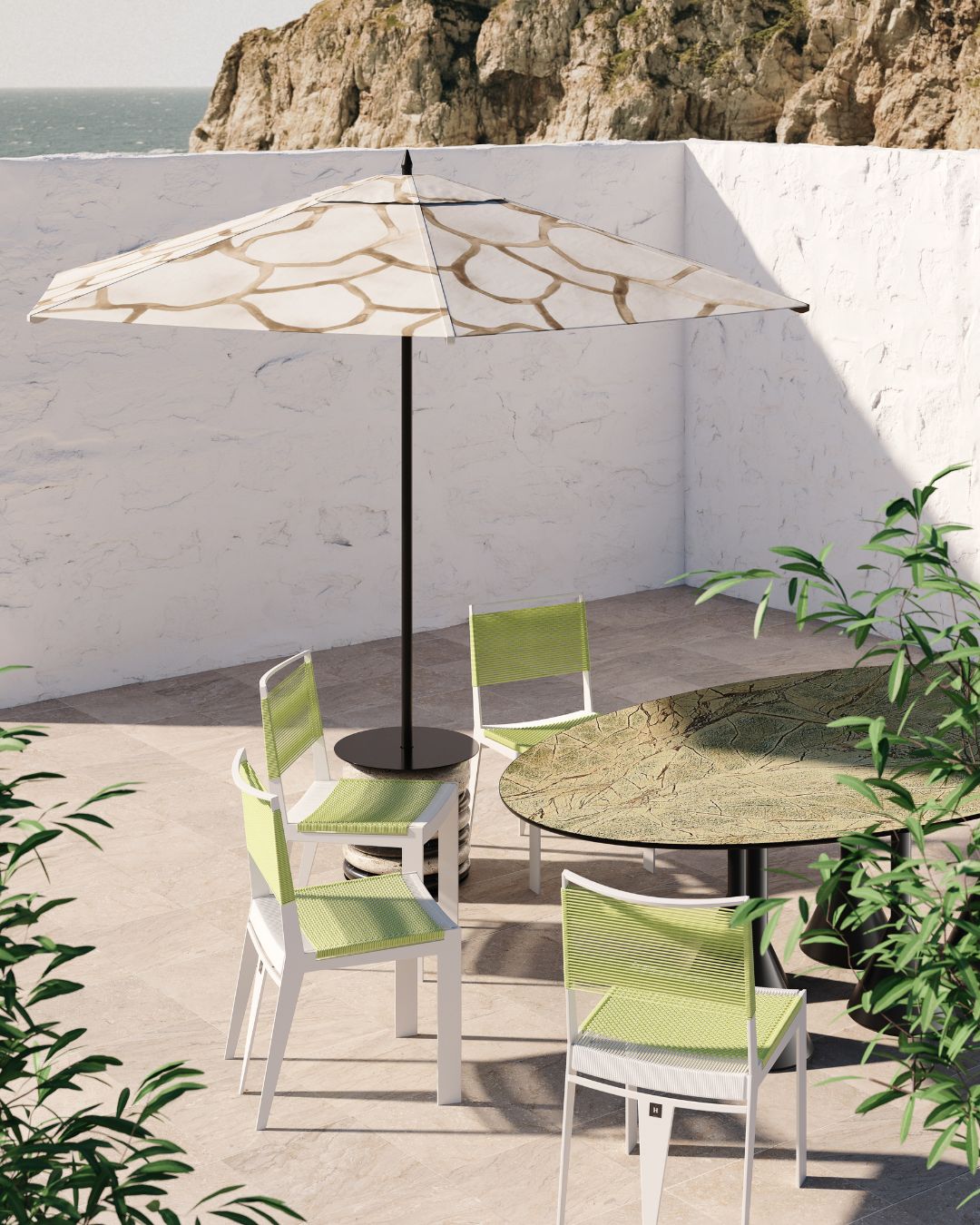 Green cinco outdoor chairs by HOMMÉS Studio