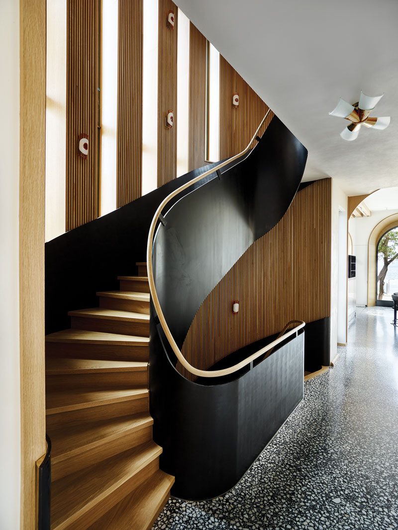 Stair with blackened-steel panels