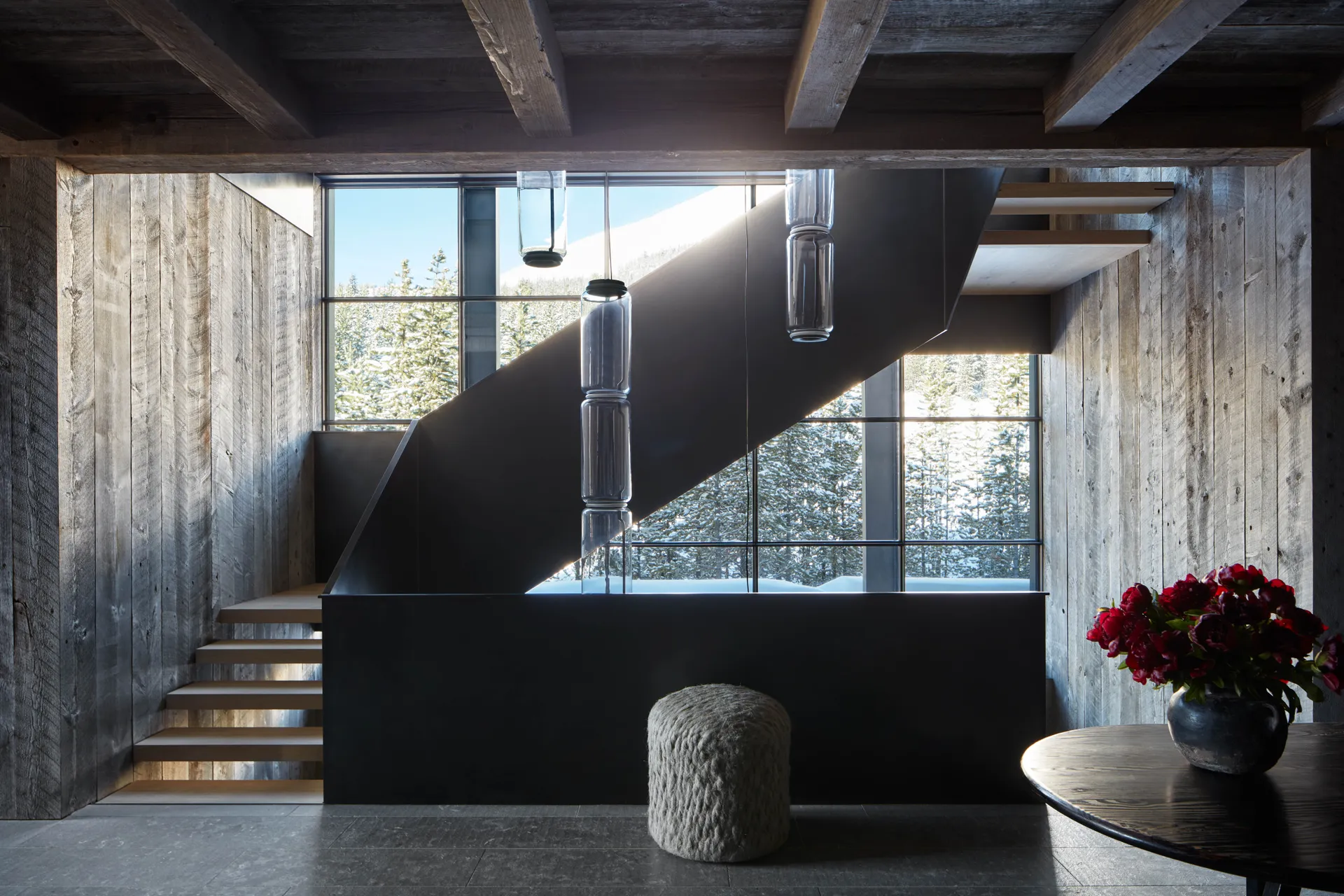 winter chalet entryway by architect Greg Matthews and the interior designer Olivia Williams