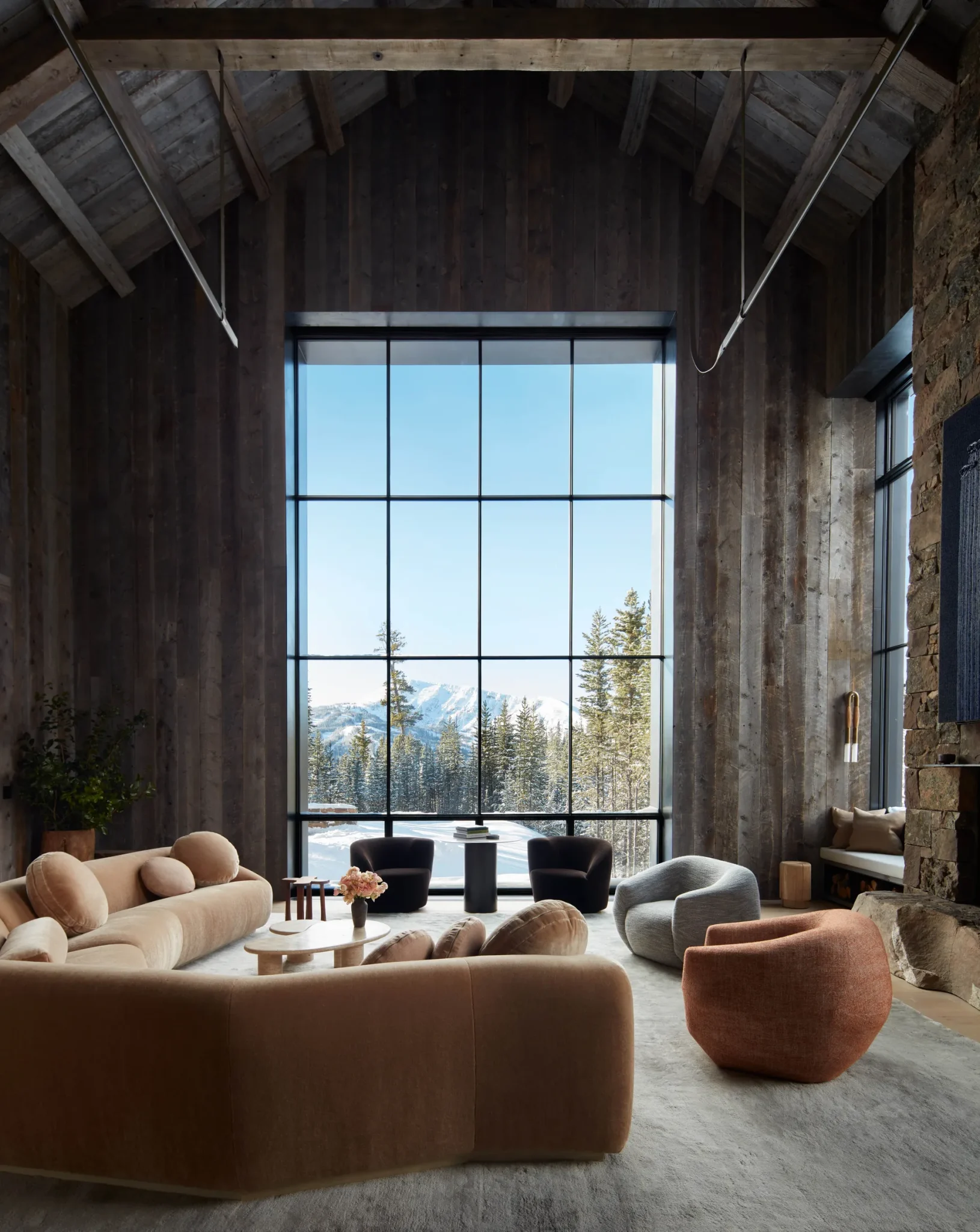 winter chalet living room with warm tones 
 by architect Greg Matthews and the interior designer Olivia Williams