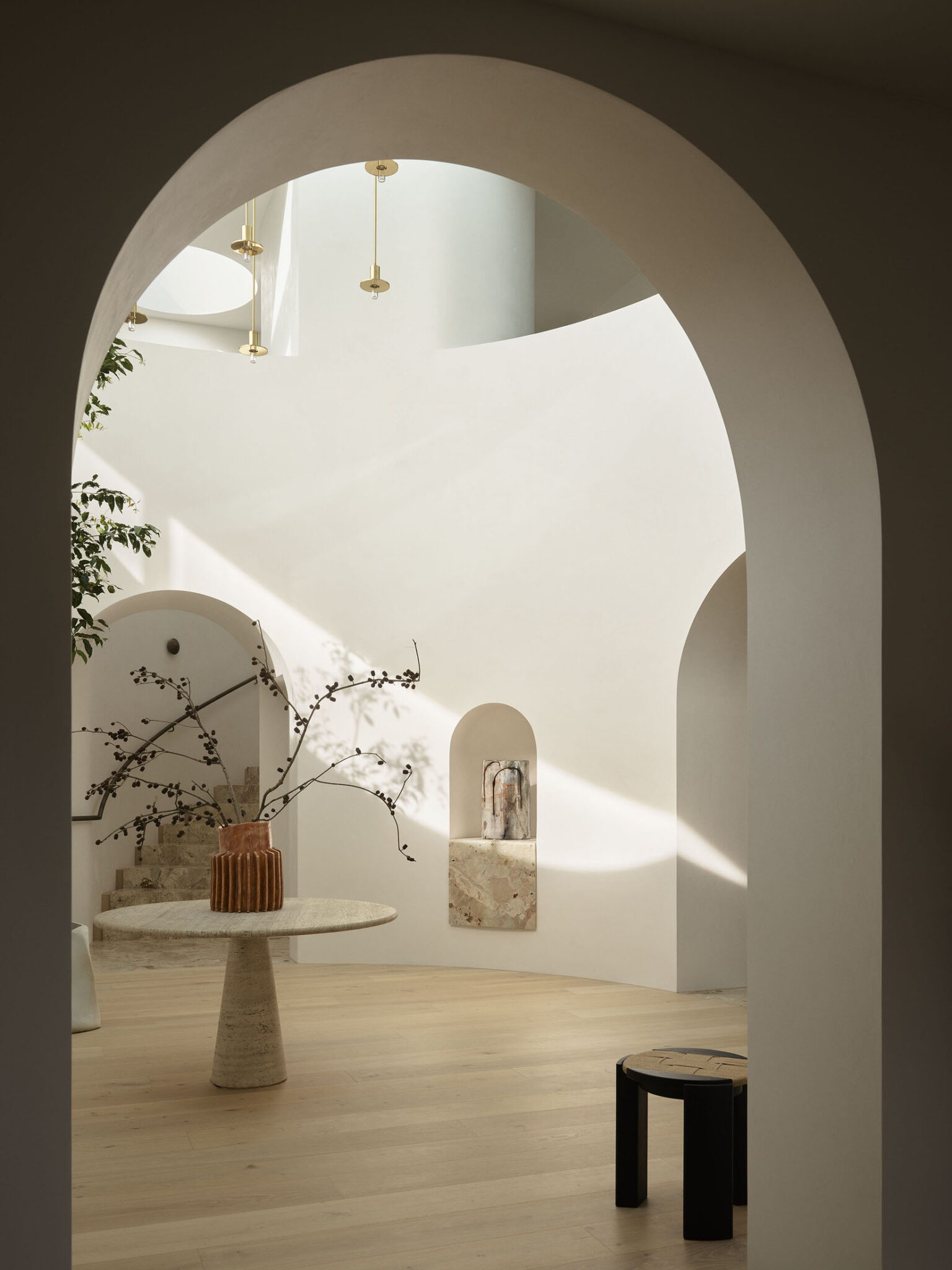 dome and plenty of natural light, centered table with a vase on it