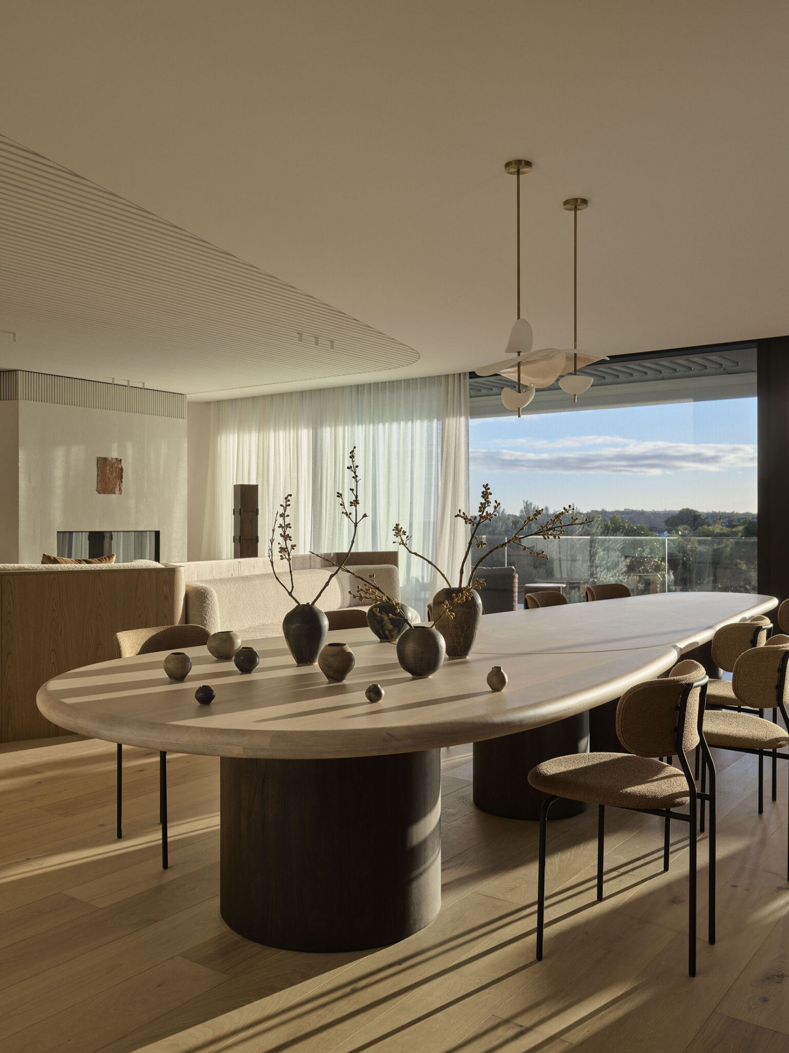 Residential architecture with large floor-to-ceiling windows, panoramic view to the bay, 20 seats wooden table