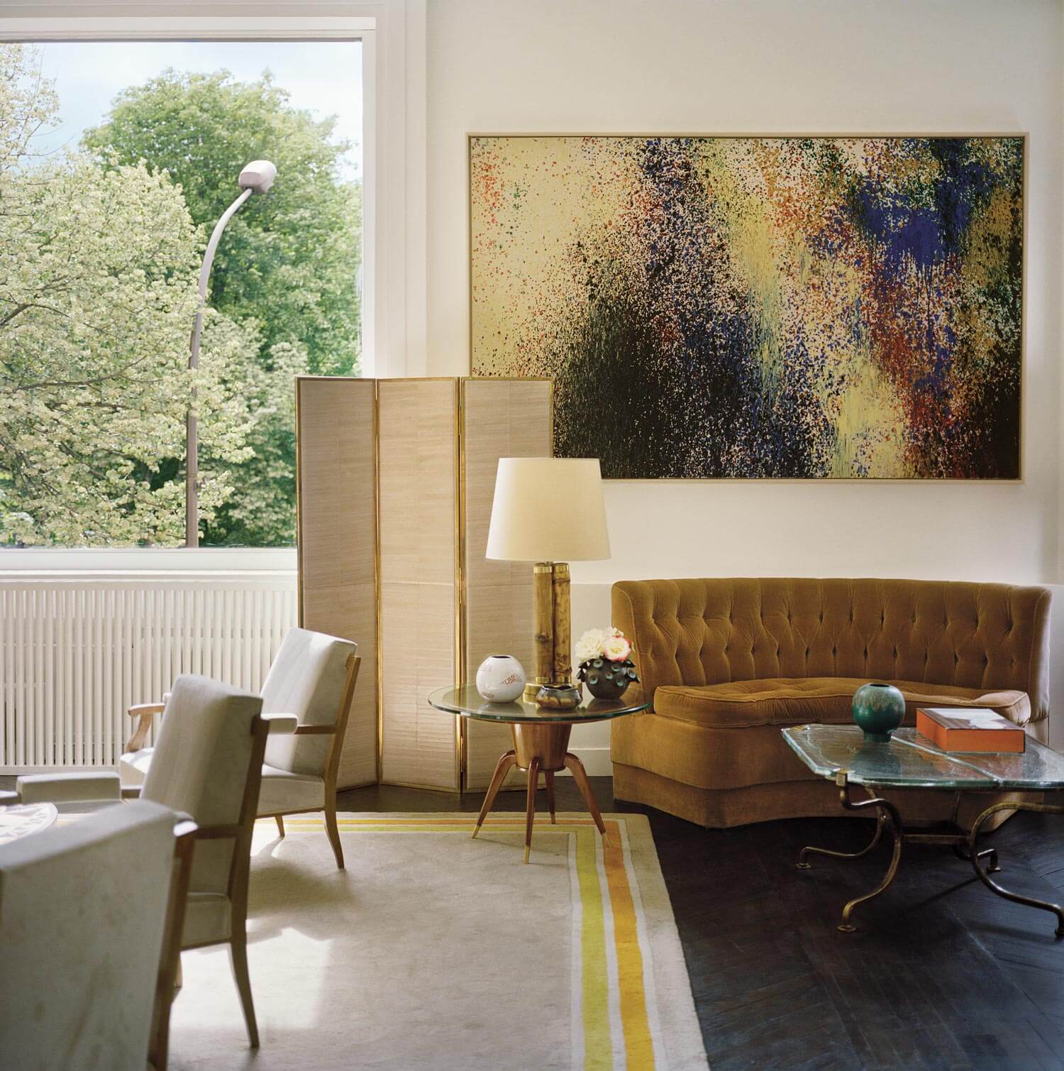 Living Room with Takashi Murakami Panels in Paris Apartment