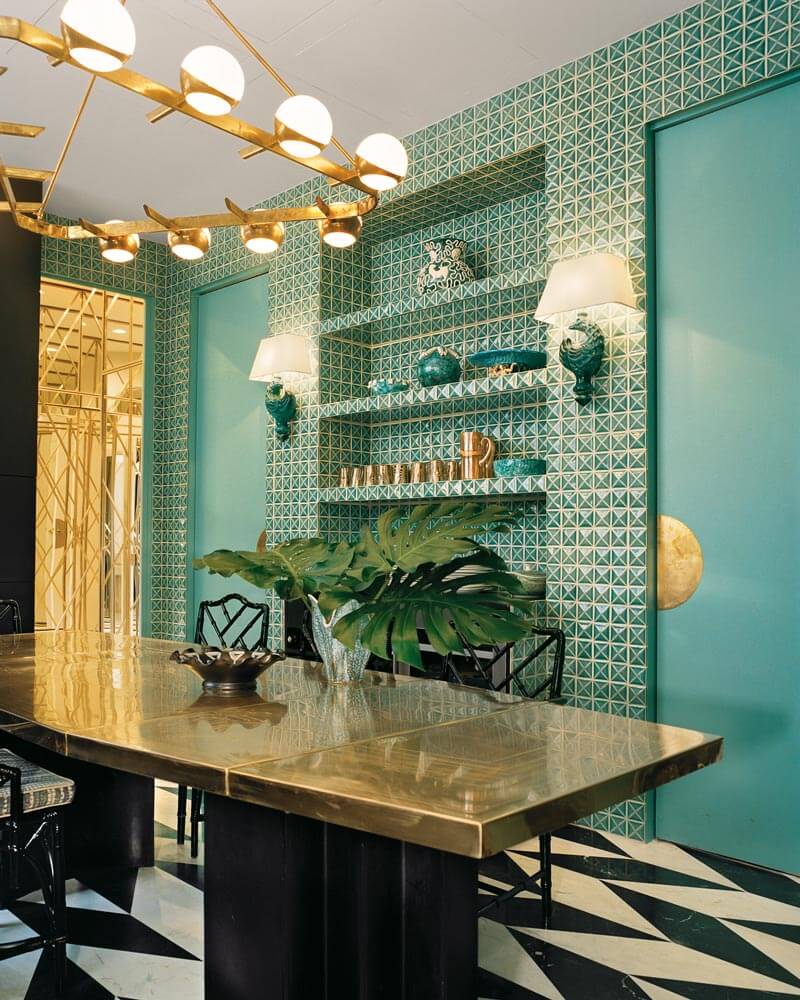 Modern Kitchen designed by Cathy Vedoni with brass countertop, monochromatic floor and walls covered with turquoise Portuguese tiles