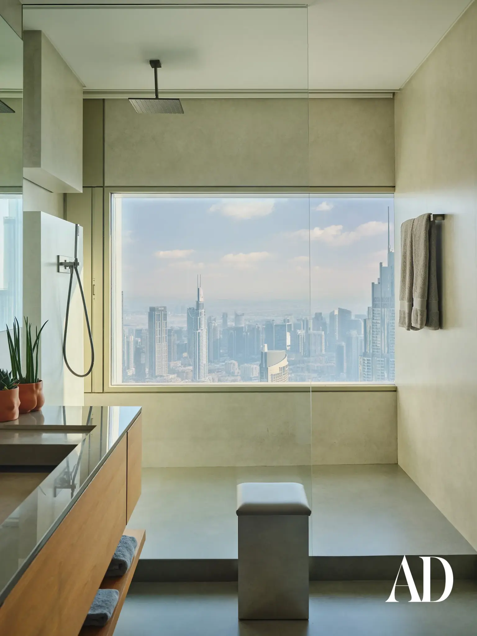 The Art of Minimalist Luxury: Inside a Dubai Penthouse Inspired by Nature , shower with the view
