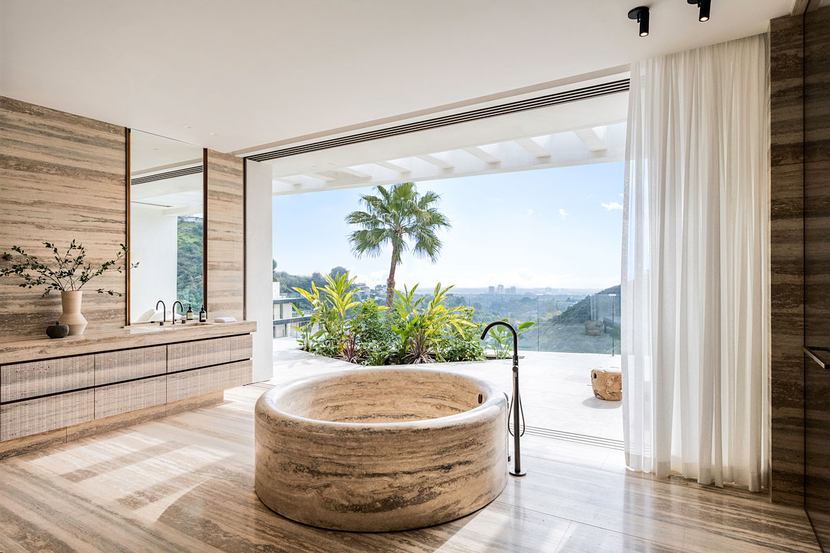 Main bathroom with a custom hand-made curved bath 