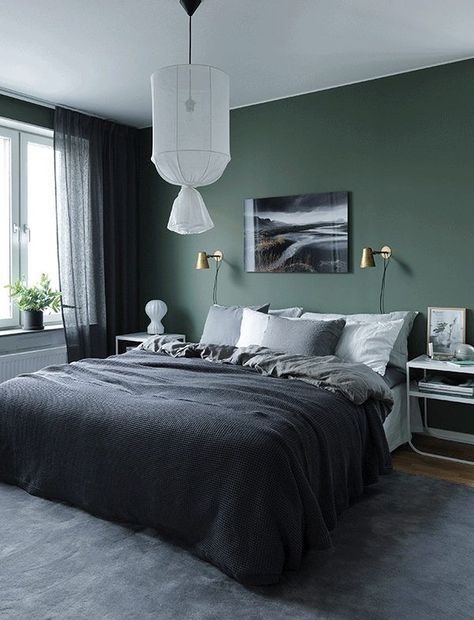 dark green bedroom with natural materials