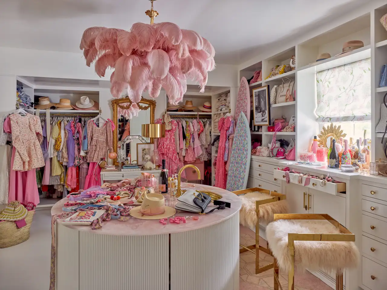 Closet featuring a big pink feathers suspension lamp