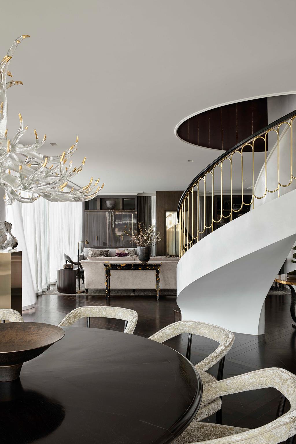 luxurious dining room in neutral tones and gold accents