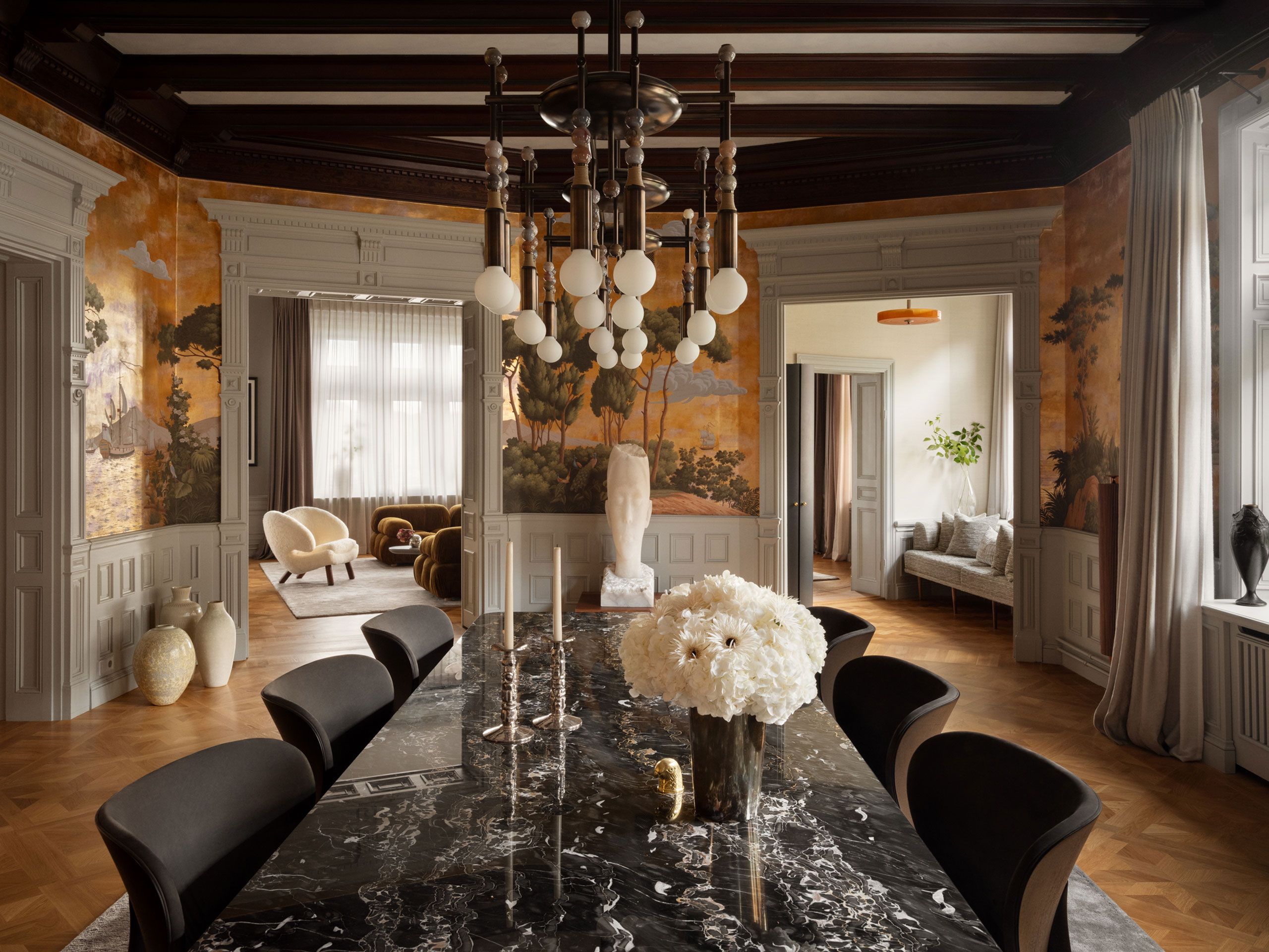Contemporary Interior Design in the Stockholm Residence by Johan Sundberg Arkitektur, living area with plenty of natural light, large dining table, chandelier