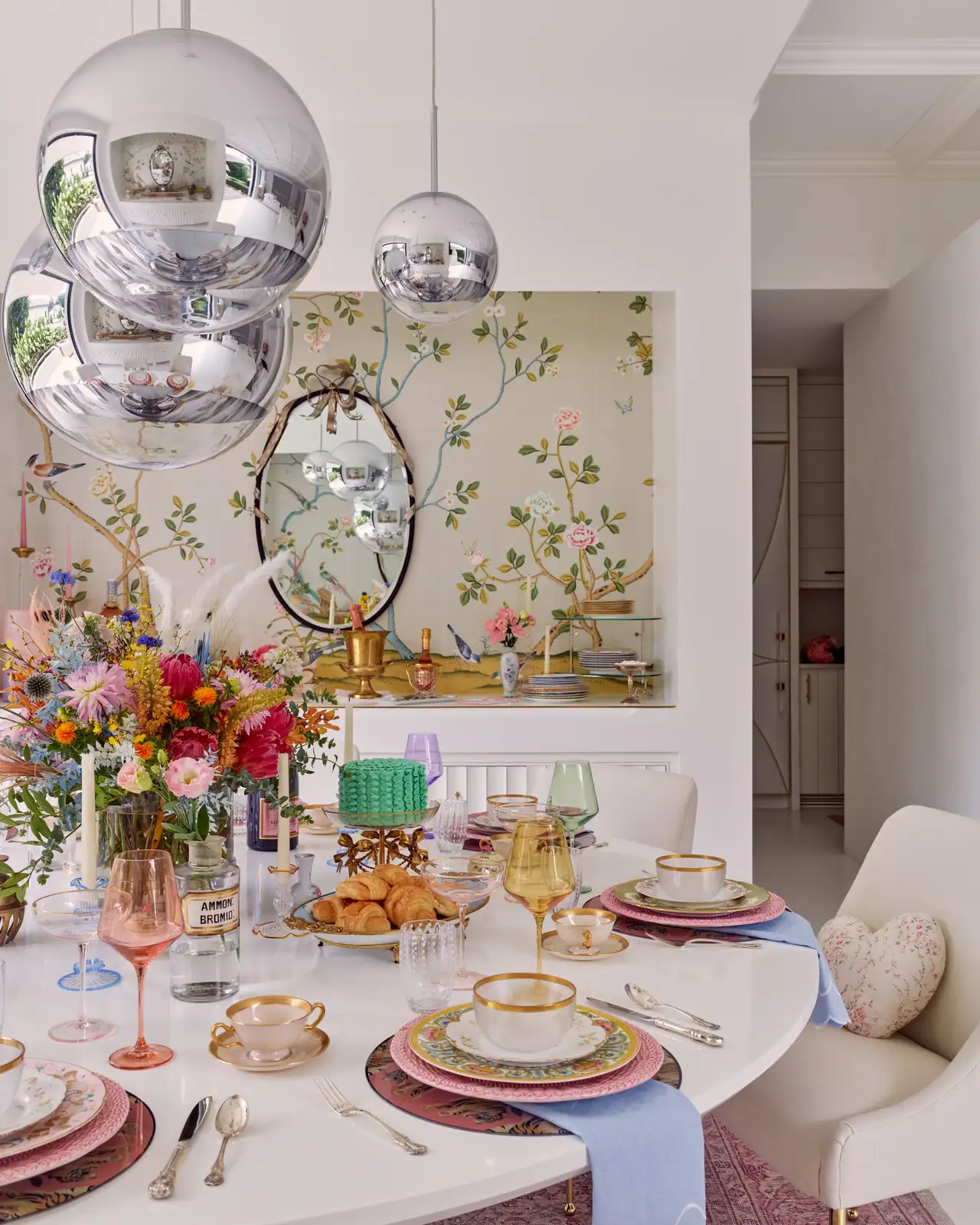 A dining table with colorful dishes