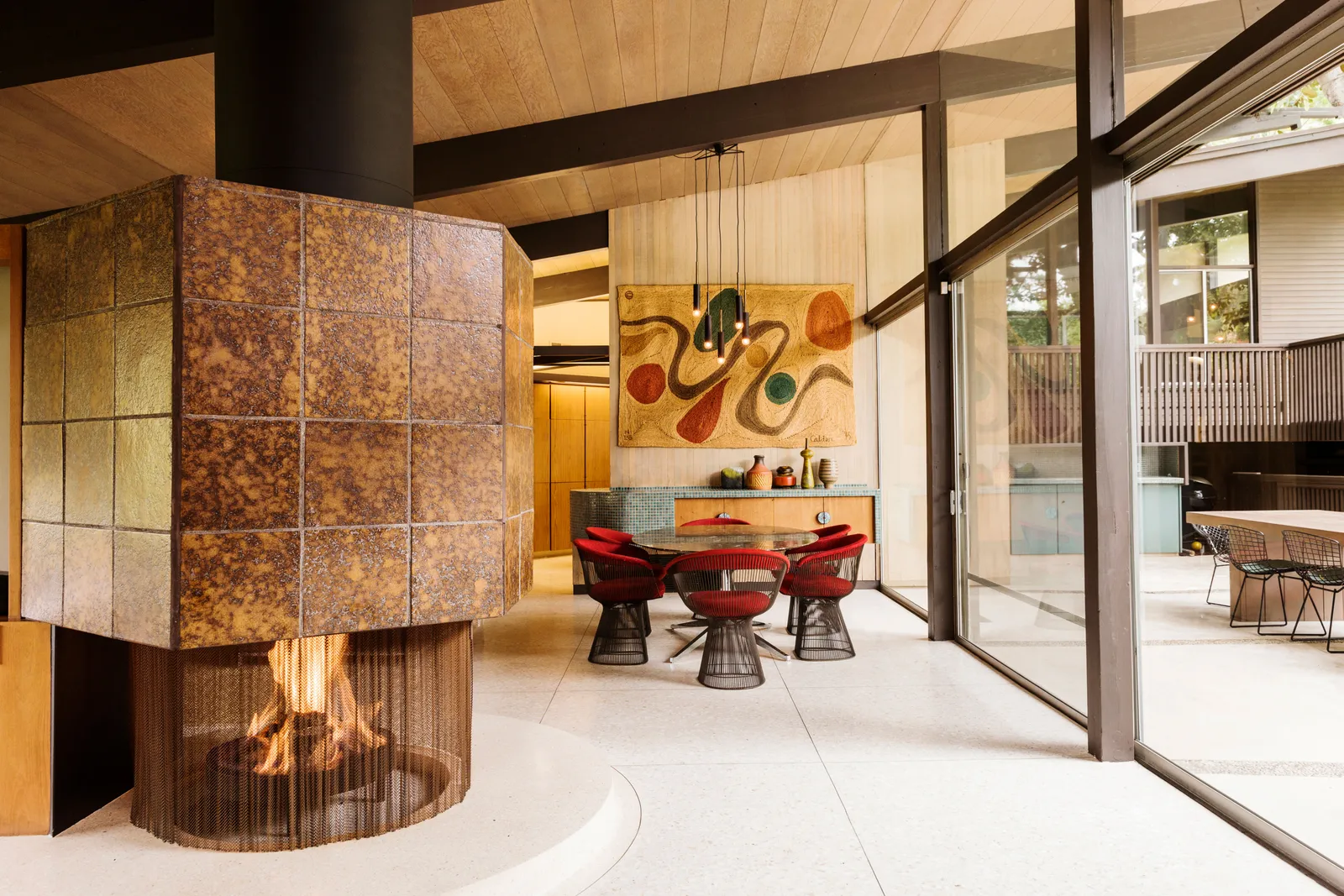 mid-century modern dining room with in a warm, neutral color scheme