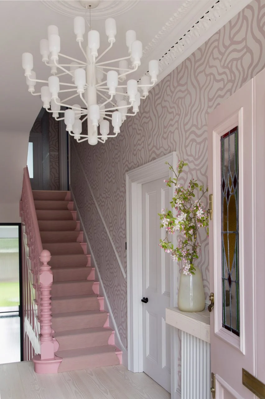entrance hall with a hand-printed wallpaper