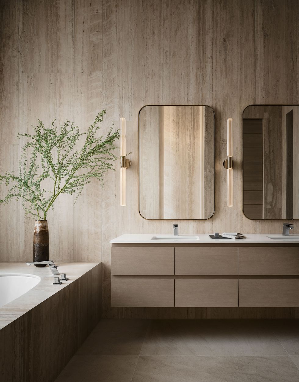 guest bathroom with a vein-cut travertine walls