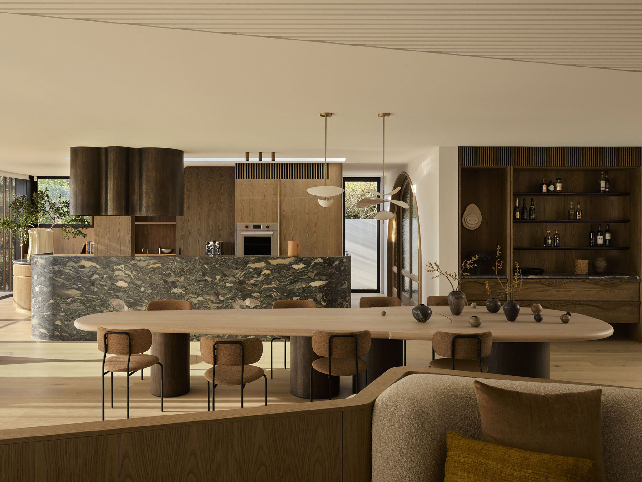large wooden table, spacious kitchen, wooden parquet, marble kitchen, plenty of natural light