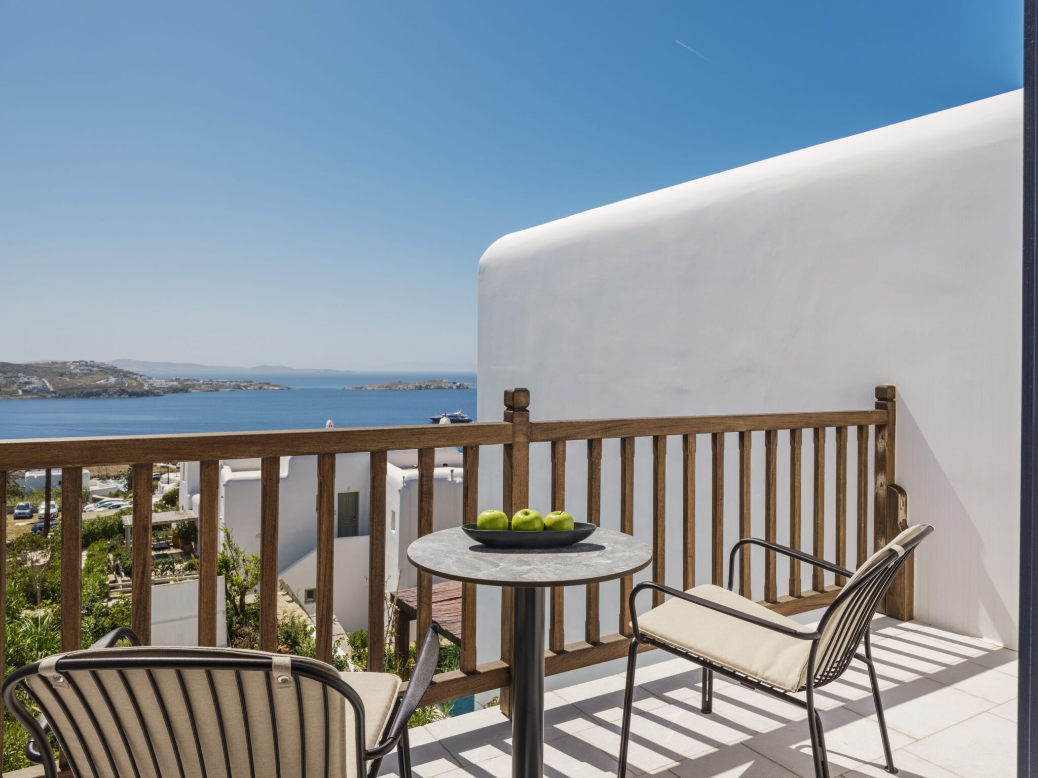 5 Exceptional Hospitality Design Experiences: Luxury Travel, view from a balcony of the Greek hotel