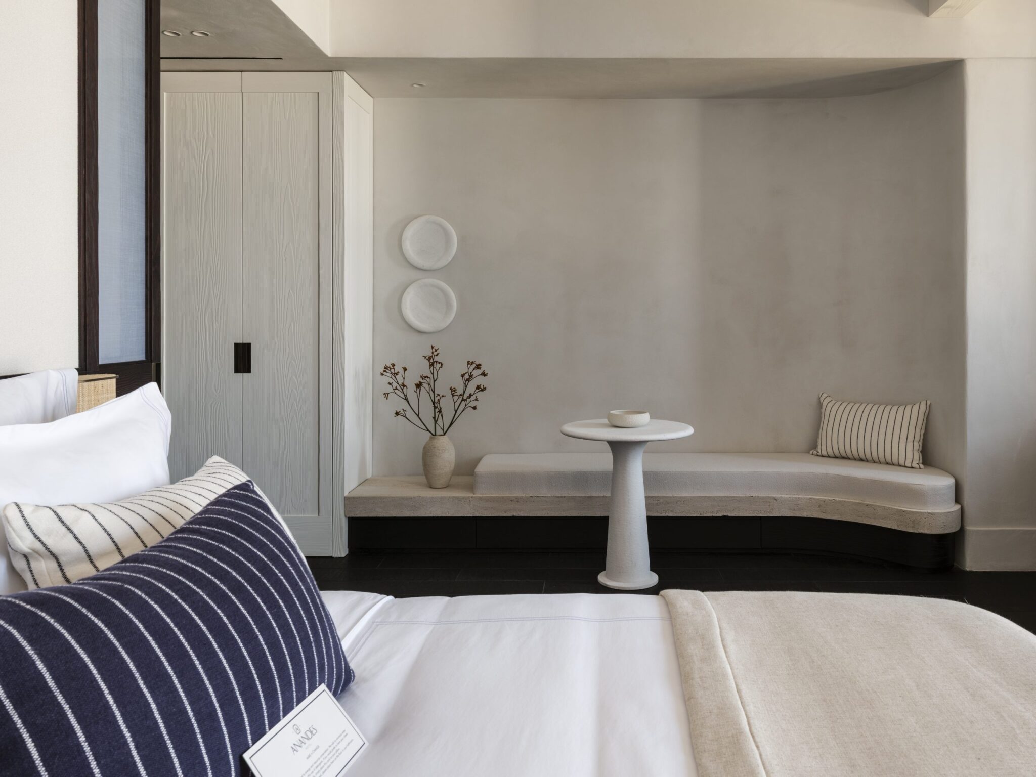 5 Exceptional Hospitality Design Experiences: Luxury Travel, bedroom with a sea view. in natural colors