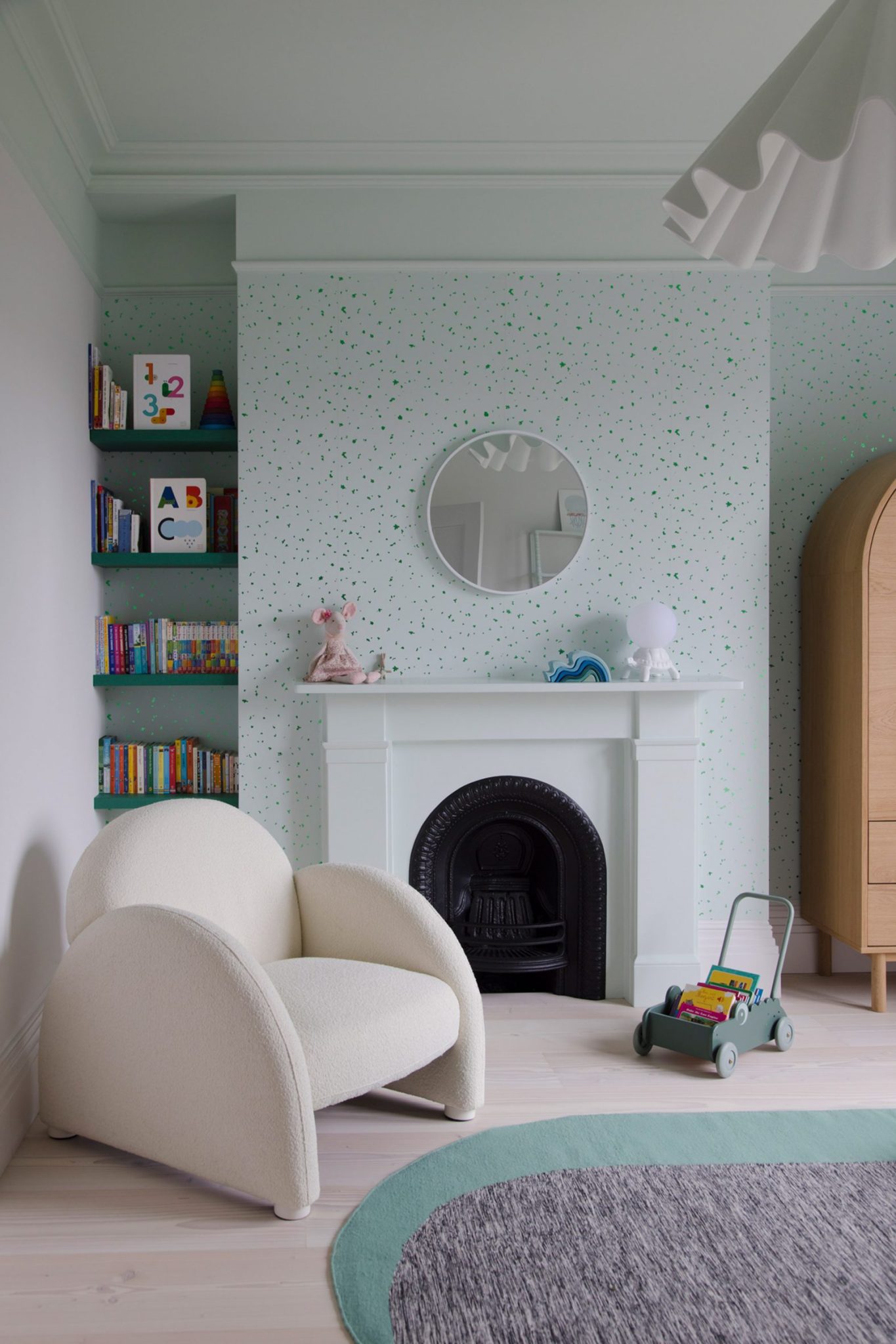 kids room with a white armchair 