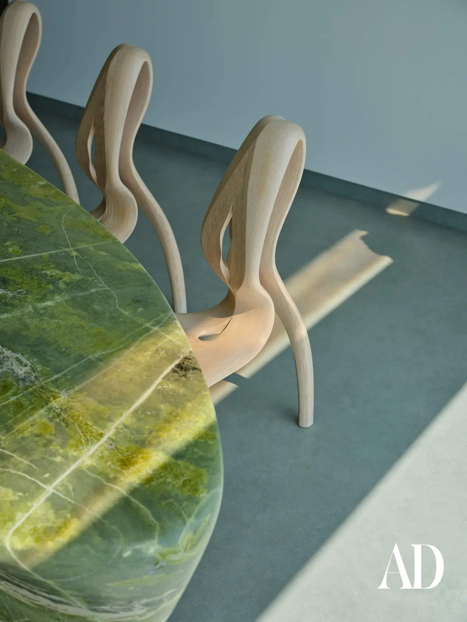 The Art of Minimalist Luxury: Inside a Dubai Penthouse Inspired by Nature , dining table with sculptured chairs