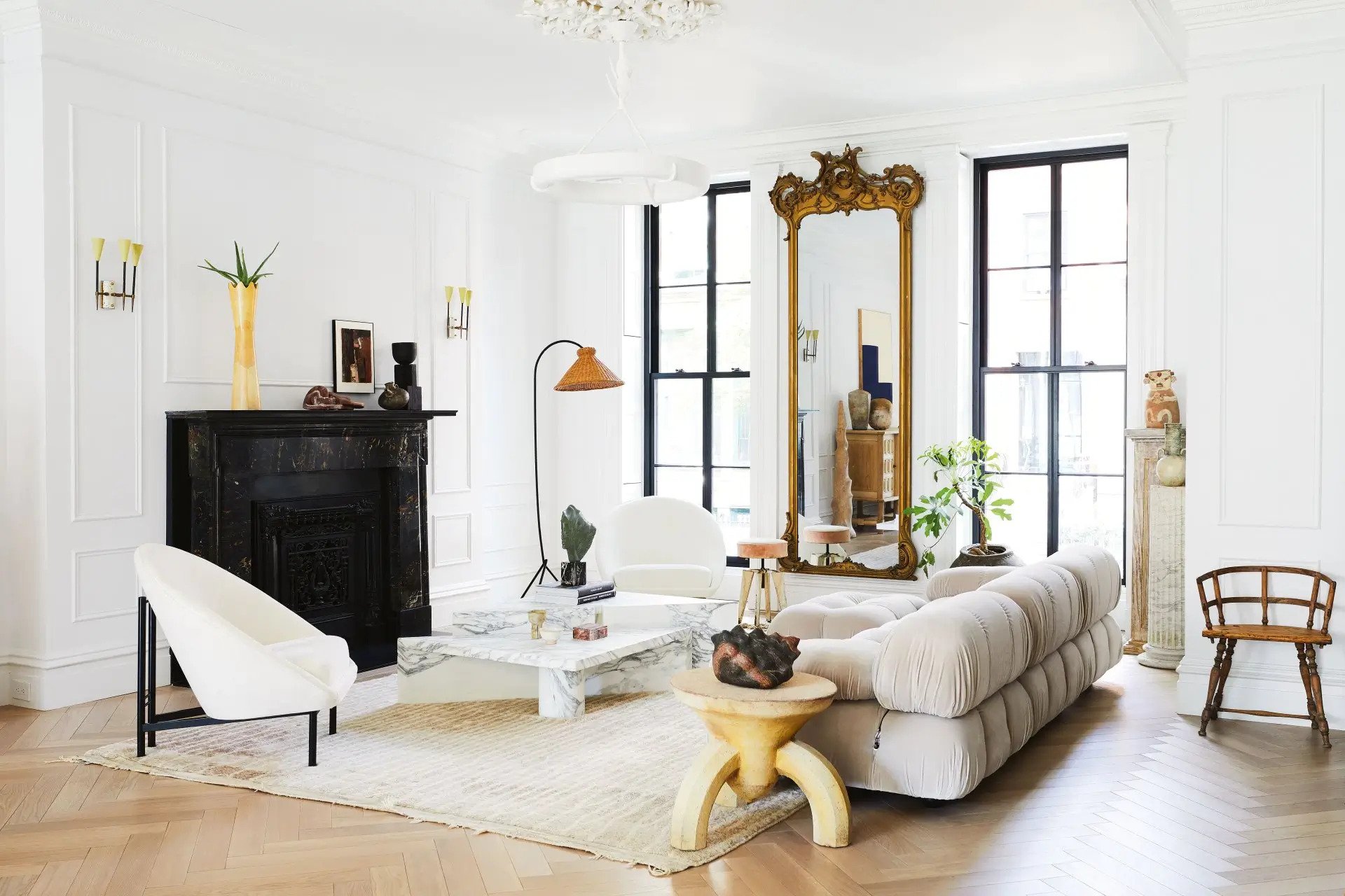 elegant living room with standing mirror on the wall as the focal point of the living room mirror design