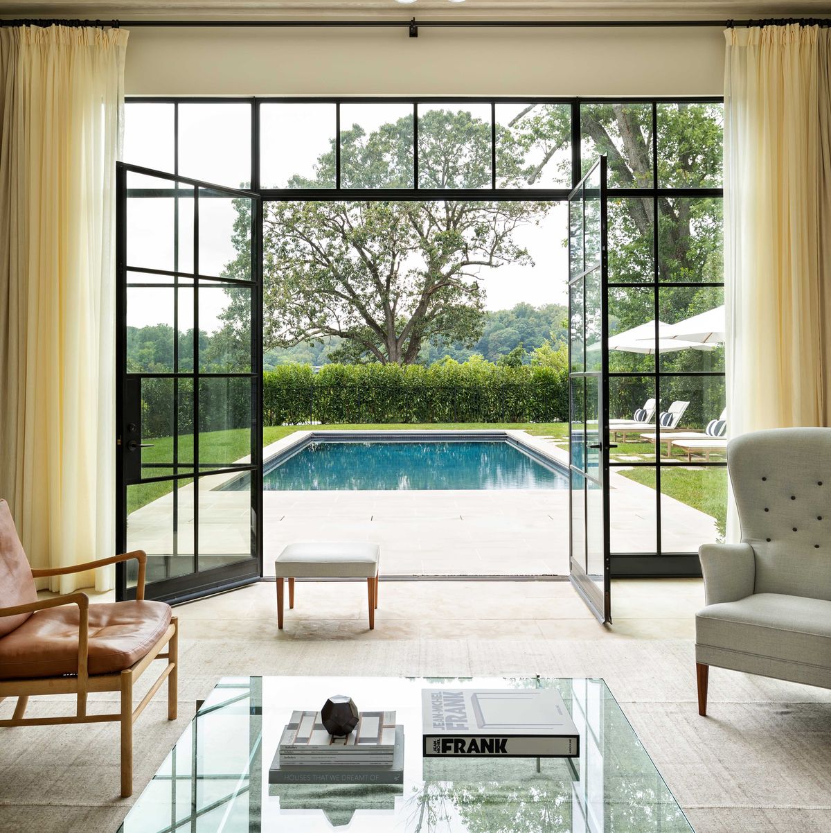 living room with a pool view