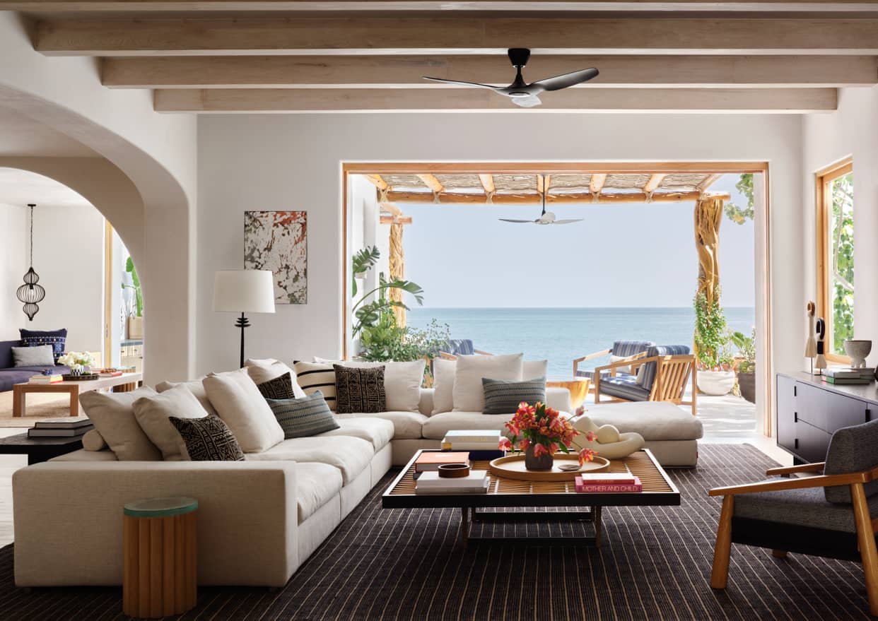 Beautiful living room in neutral tones and amazing view - design by Nicole Hollis