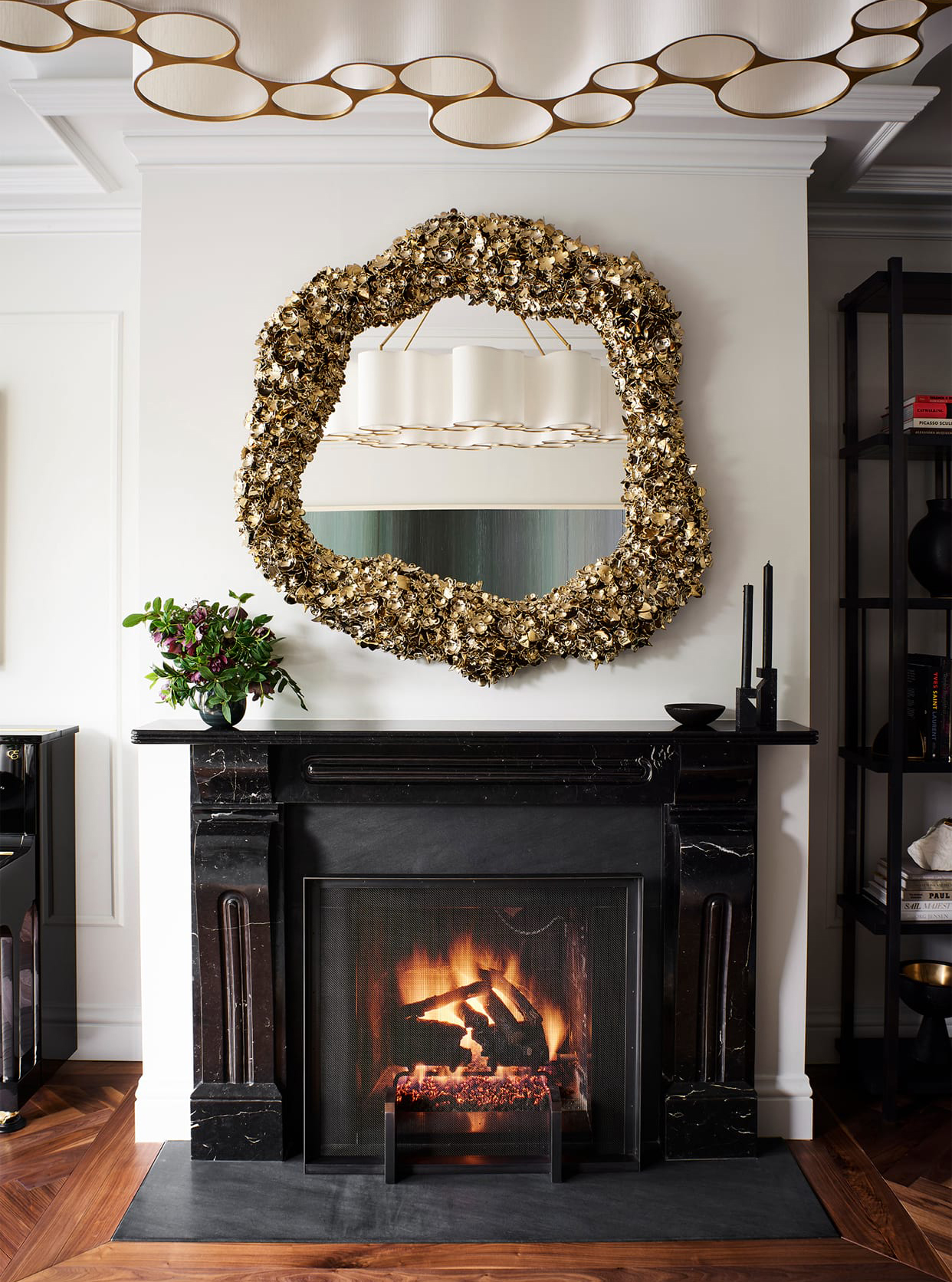 fireplace with a stunning mirror - nicole hollis