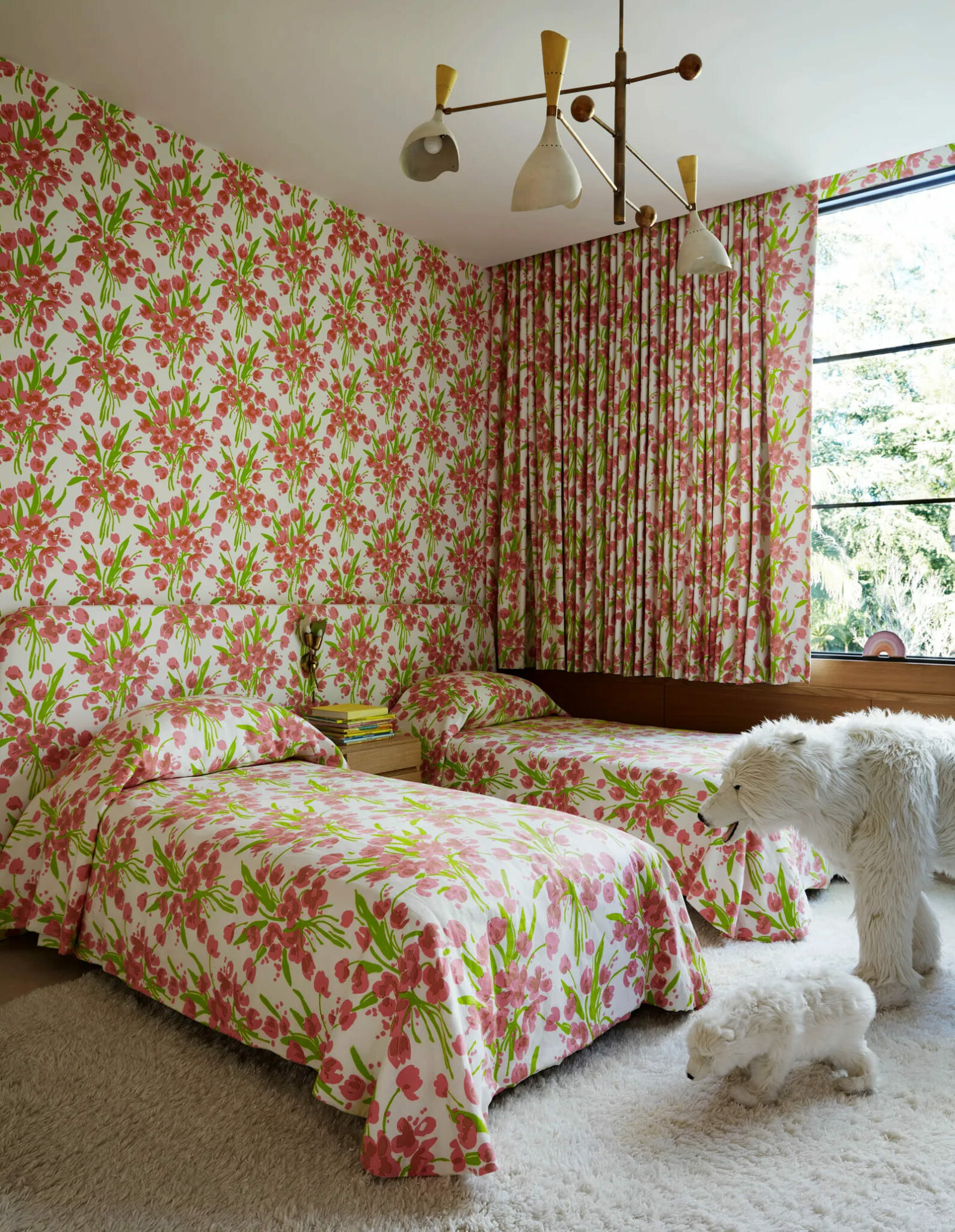 Eclectic children's bedroom in a bold floral print