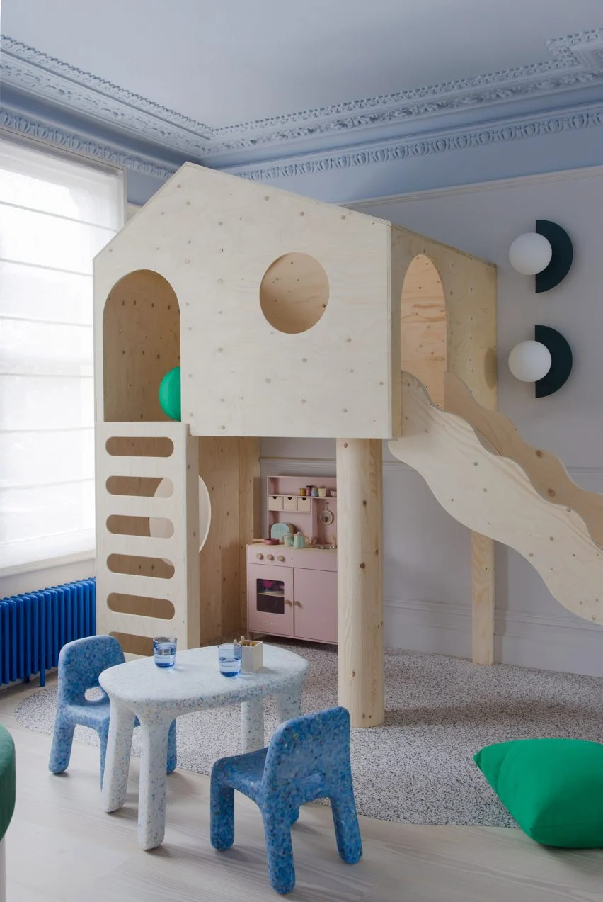 kidas room with a playhouse