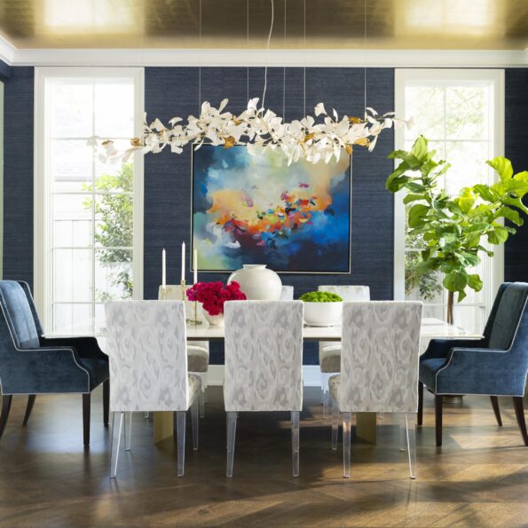 blue decorated dining room with sophiscated lamp
