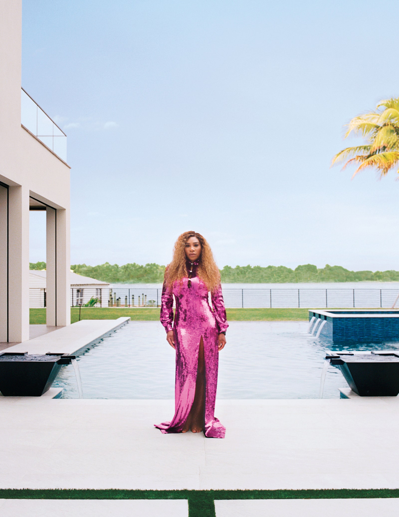 Serena Williams posing for Architectural Digest March Cover wearing a Gucci dress in her new home in Florida